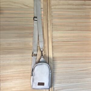 Wrangler faux leather and canvas sling natural